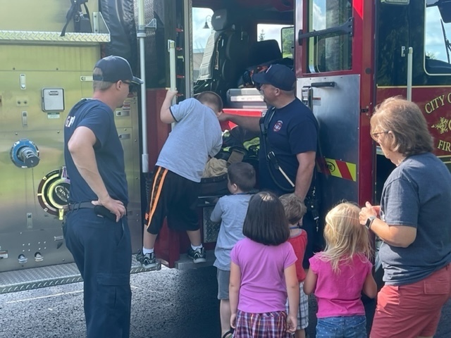 Students touring fire truck